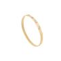 Bangle in oro giallo con spot di diamanti