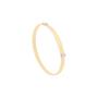 Bangle in oro giallo con station in pavé di diamanti